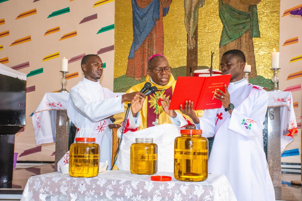 Bishop Vincent Mwakhwawa, DP, blesses the Holy Oils during the Chrism Mass at Maula Cathedral on Tuesday